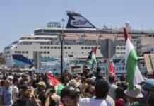 Greeks Confront Zionist Israelis on Crete; Max Blumenthal Condemns Corporate Media Coverage of Gaza; Chris Smalls Speaks Out Against IOF, Liberals and Union Leaders; SF Mime Troupe Takes on Billionaire Oligarchs